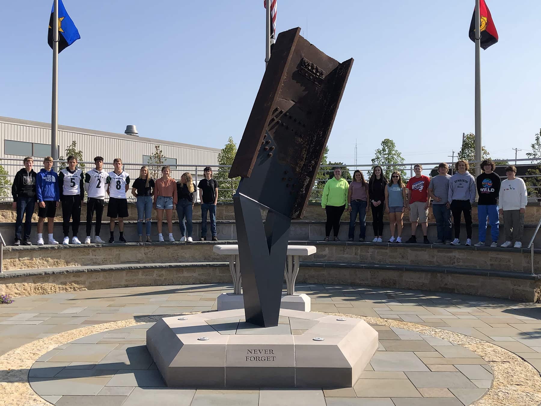 Students stand at the 9/11 Memorial