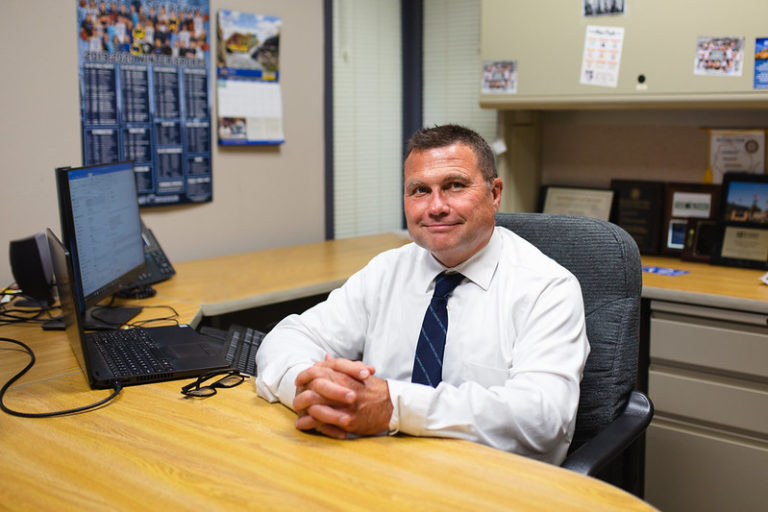 Pete Rettler sitting at his desk at Moraine Park