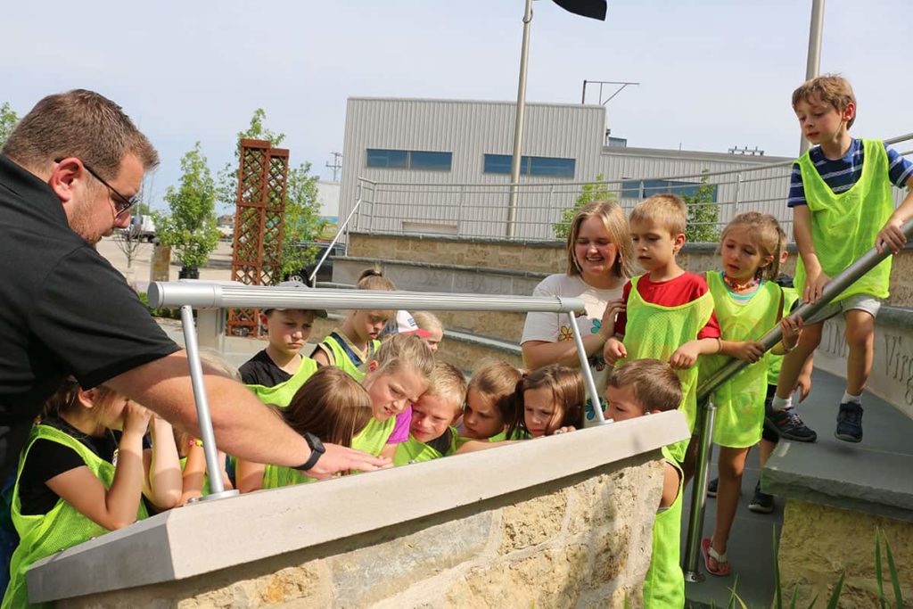 A group of students learn about September 11th, 2001.