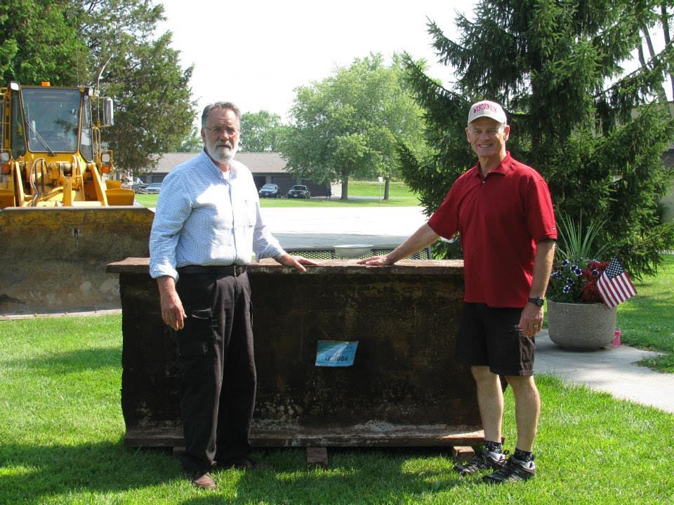 Gordon Haberman and Jerry Gosa with the steel beam from the WTC. 
