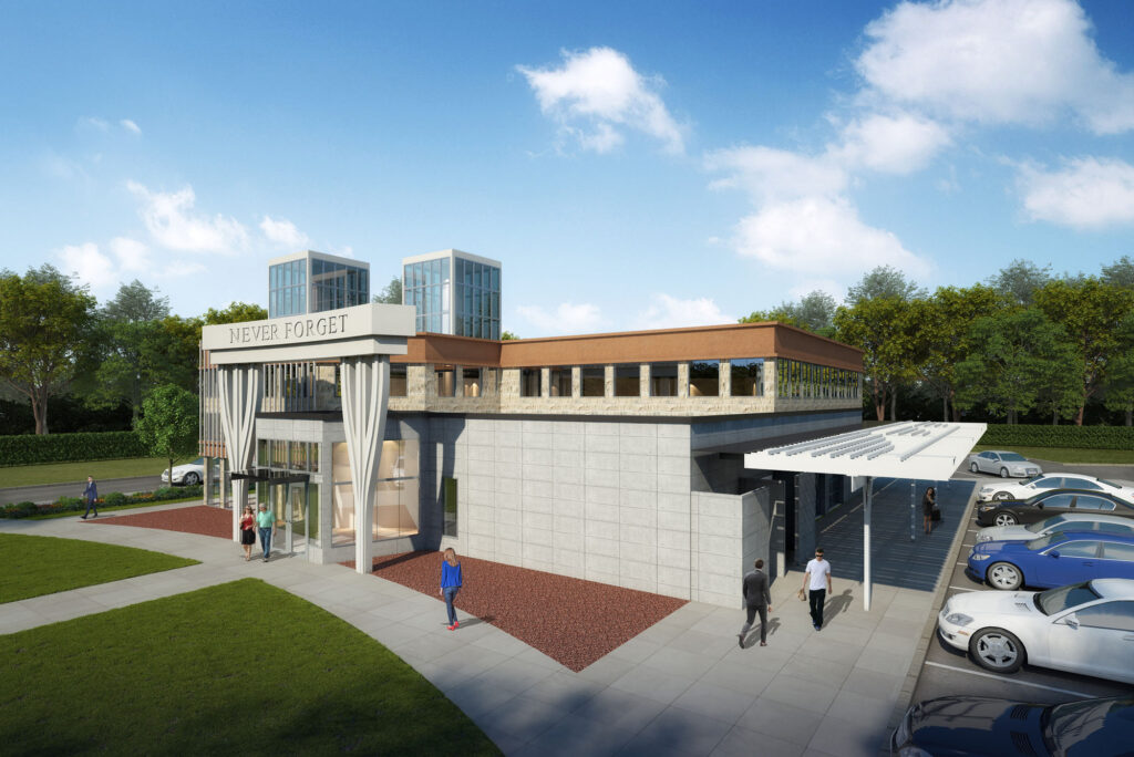 Side view of the future museum during the day, showing the side pavilion entrance, adjacent parking lot, and covered walkway.
