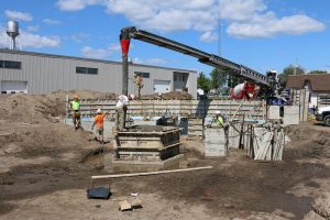 Concrete being poured for the base