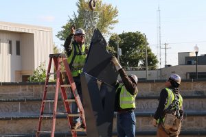 Installers preparing beam for the beam